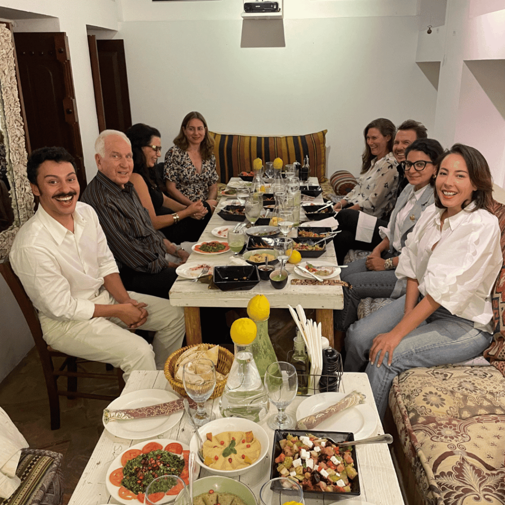 Nadine Zidani having dinner with a group of people