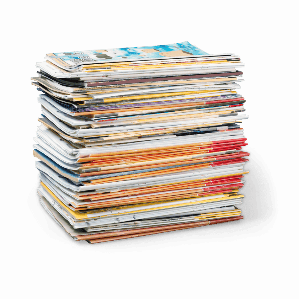 Group of publications stacked on top of each other