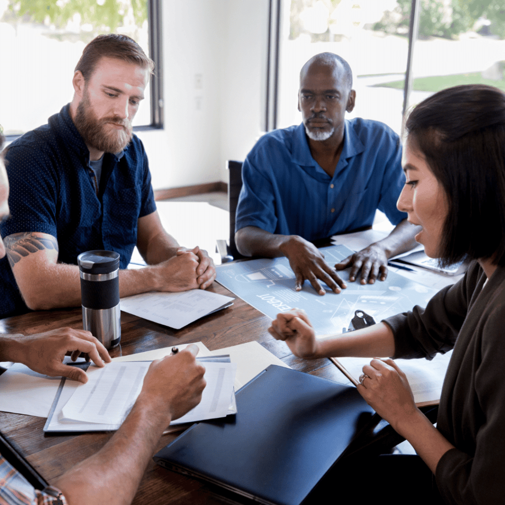 People Discussing work on a table