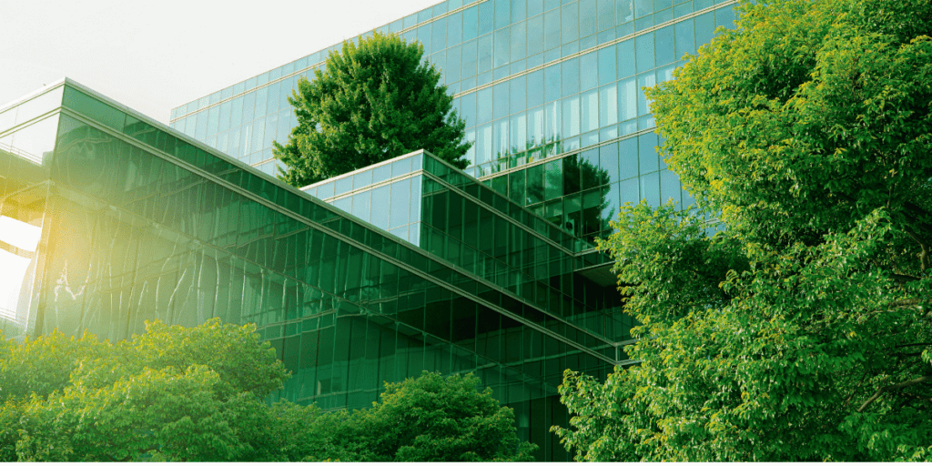 Green Trees surrounding a corporate building