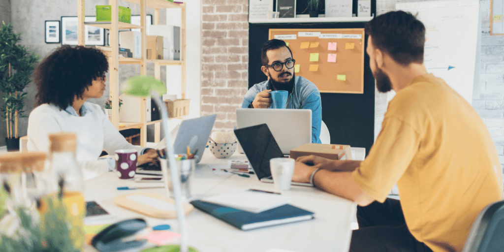 People Discussing work in an office